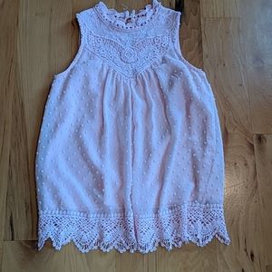 High neck, sleeveless swiss dot top